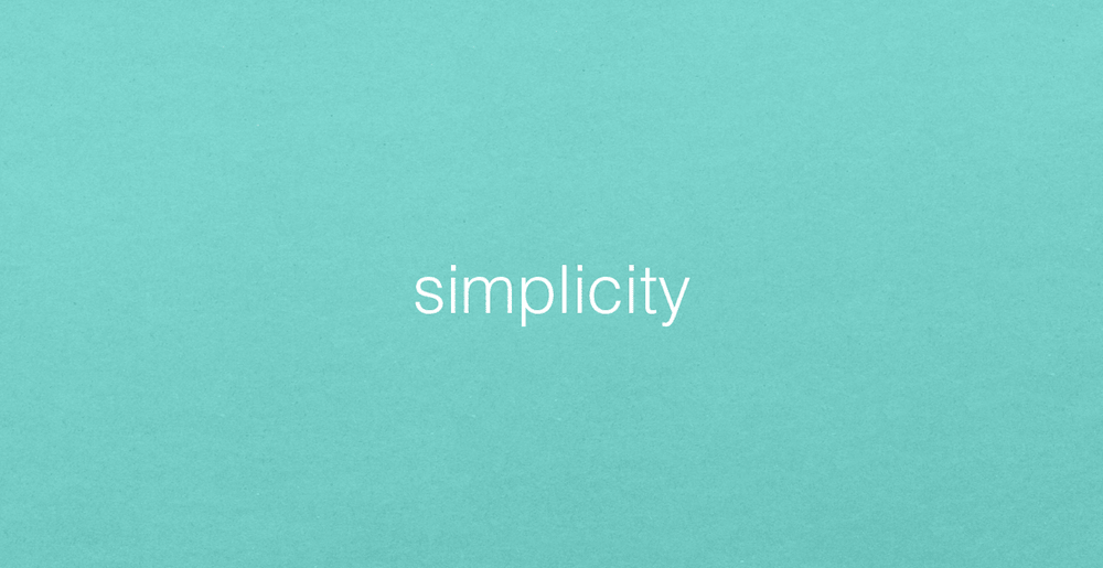 The word SIMPLICITY in white letters on a teal background showing simplicity in design.