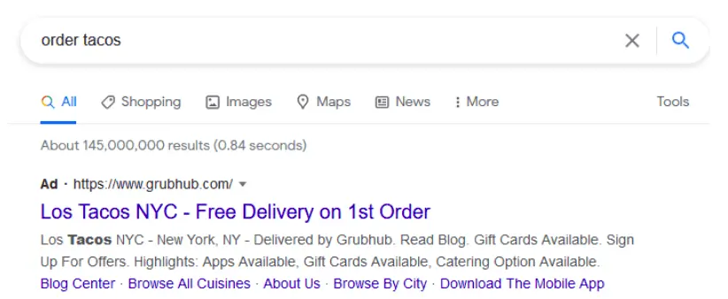 A paid ad in the Google Serps for GrubHub (an example of cross-channel marketing)