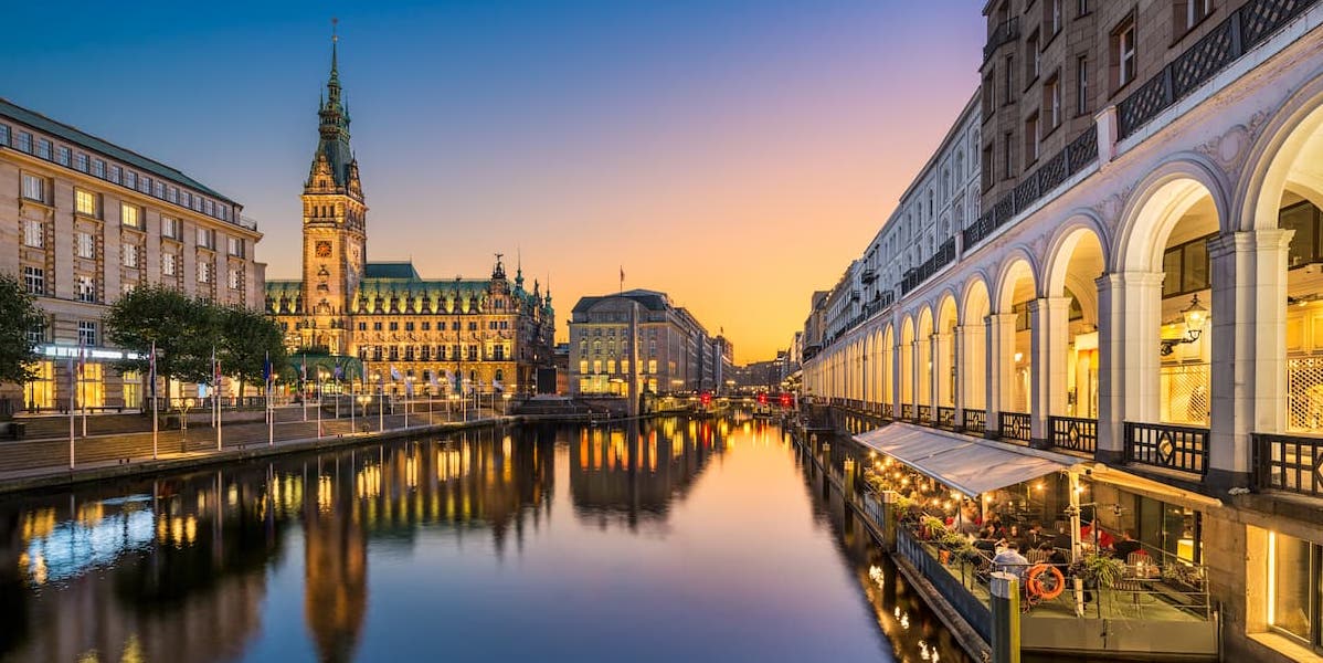 Photo showing a canal and old building in the German city of Hamburg, one of the country's tech hubs.