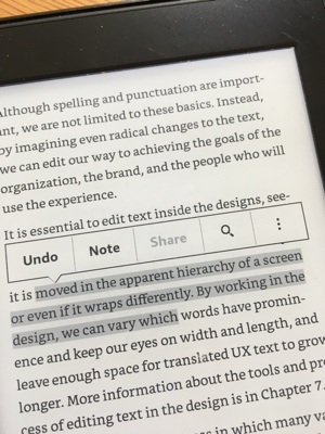 Photo of a Kindle Paperwhite screen, focused on a portion of highlighted text in the Kindle user interface