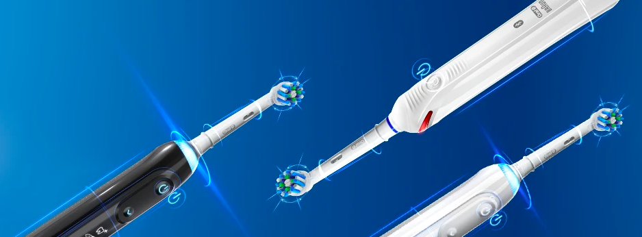 Screenshot from the OralB website, electric toothbrush shopping page. Features three electric toothbrushes on a blue background.