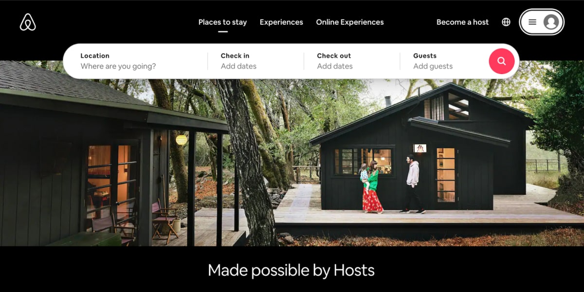 Airbnb's home page features a menu at the top and a search bar below it